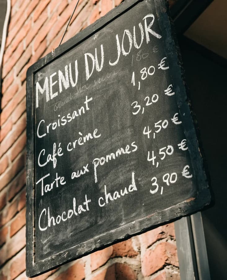Café chalkboard generated by Recraft V4.1: the price column is shifted and 4,50 € appears twice.