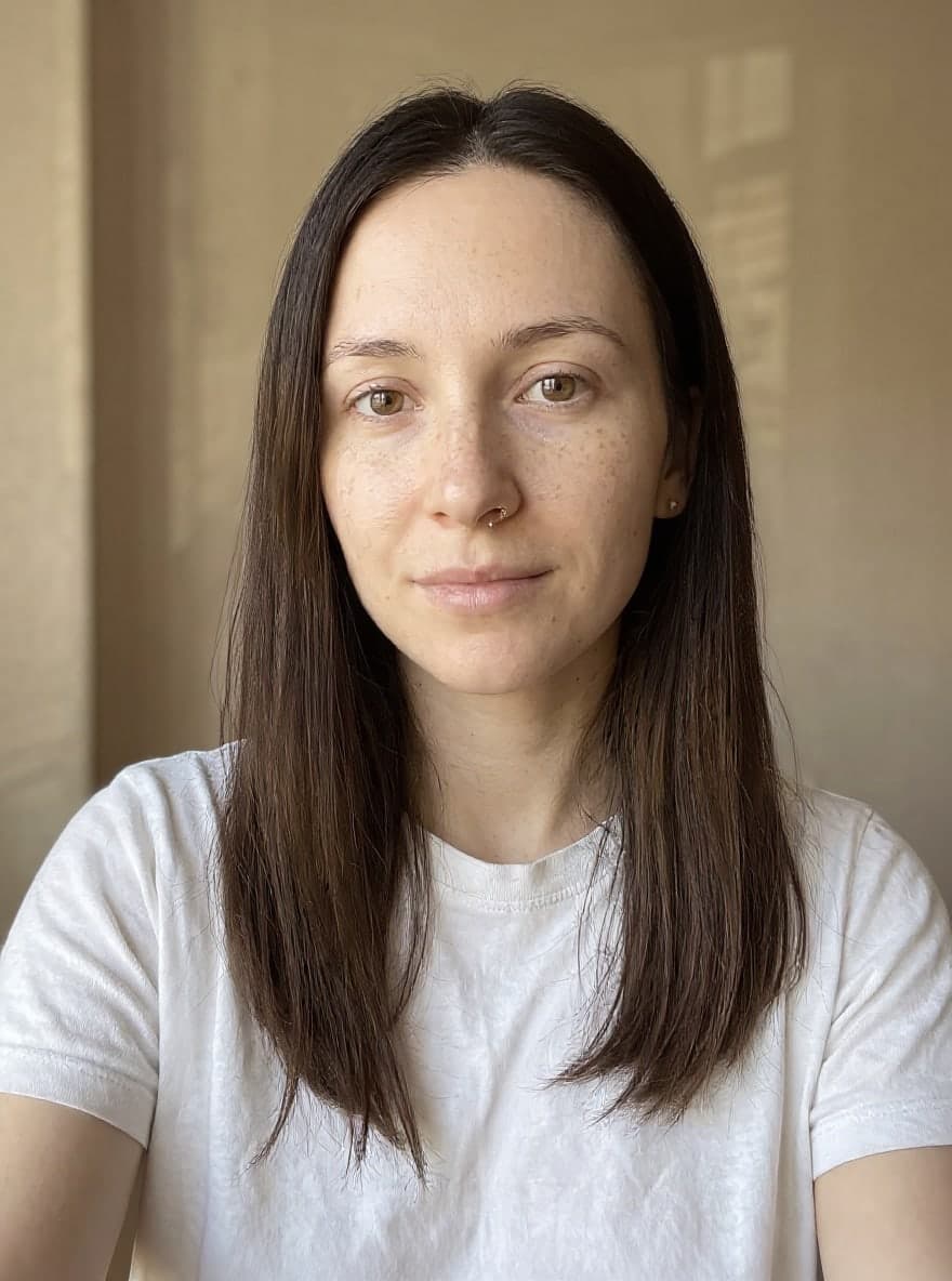 The same woman with a fine gold nose ring